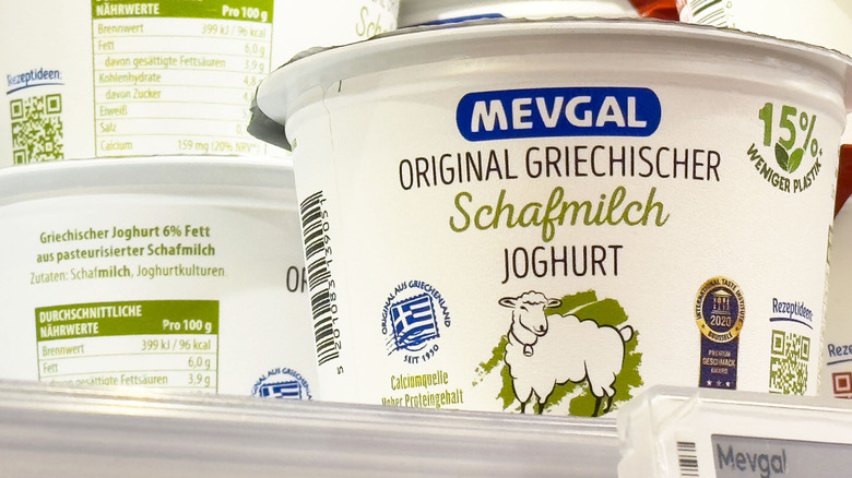 A grocery store stocks sheep's milk yogurt.
