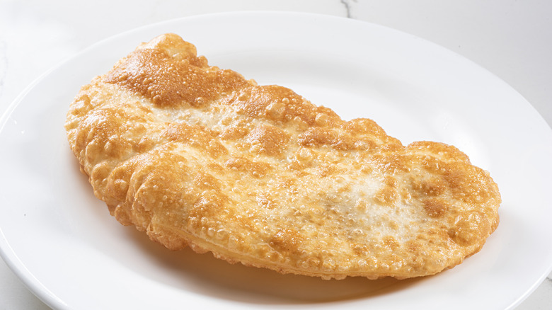 Fried dough on white plate