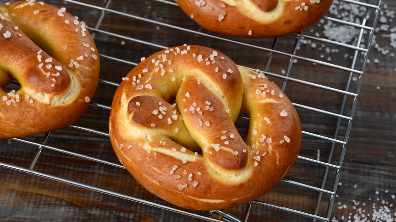 Homemade soft pretzels on a wire rack