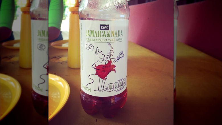 bottle of Jamaica & Nada on brown table