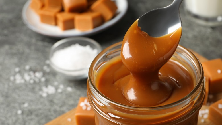Spoon of caramel sauce