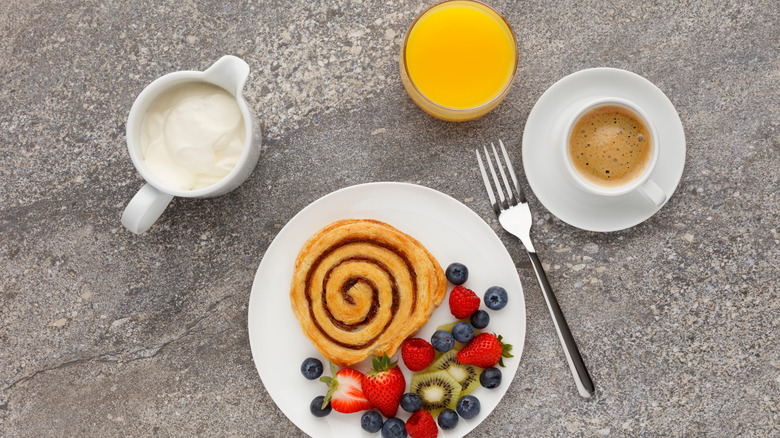 cinnamon roll and orange juice