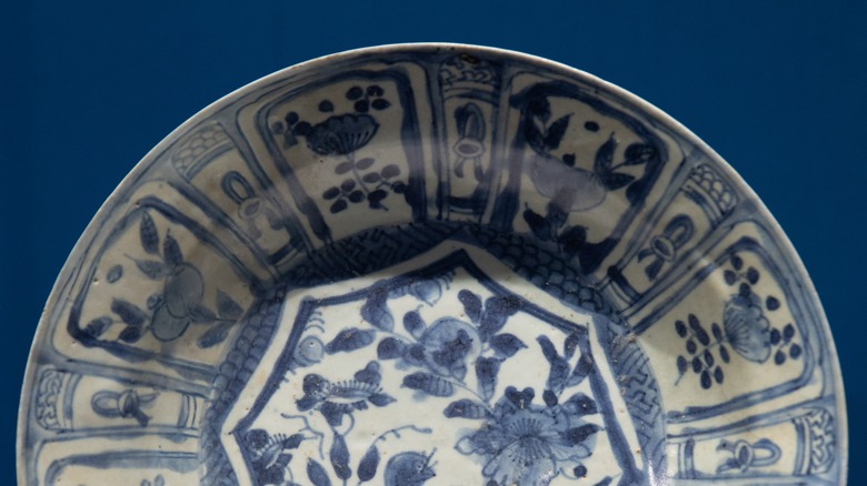 delft china pattern on dark blue background