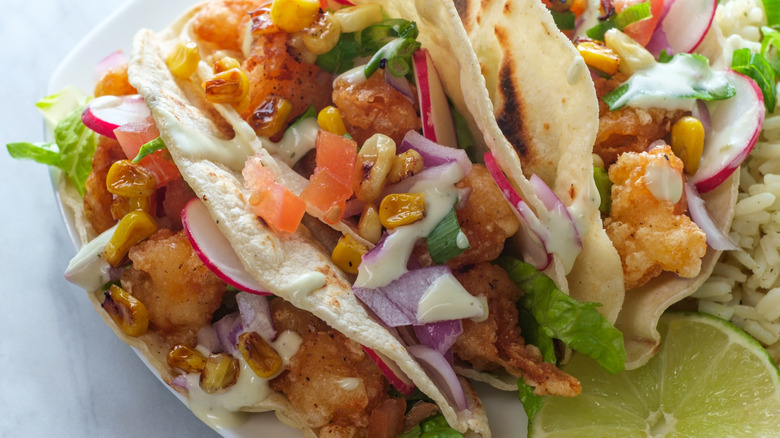 Chicken tacos with herbs and pico