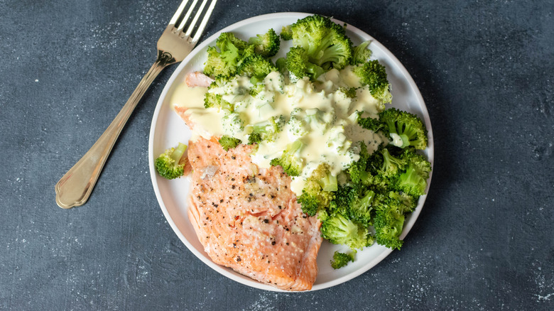 salmon with broccoli covered in hollandaise