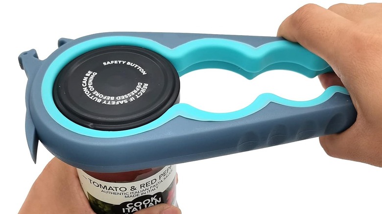 Otstar jar opener being used to open pasta sauce