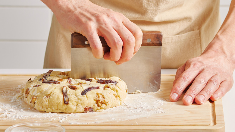 Bench scraper cutting scones up