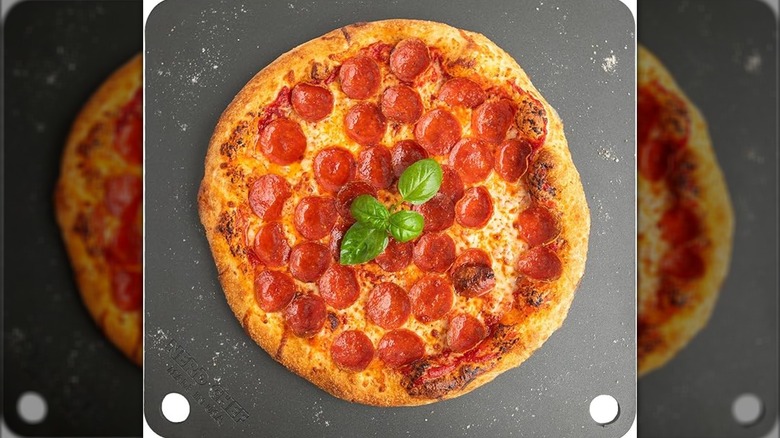 NerdChef steel stone with a pepperoni pizza