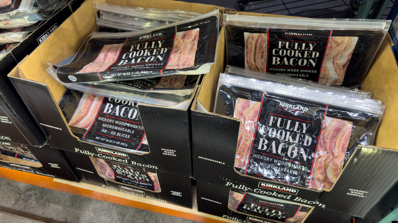 Packages of Kirkland Signature Fully-Cooked Bacon in boxes