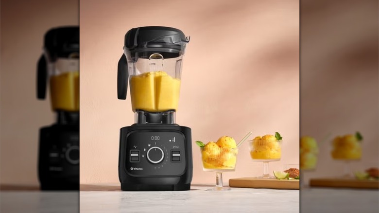 Vitamix Alta Pro Blender with two glasses of yellow fruit ice cream on the side