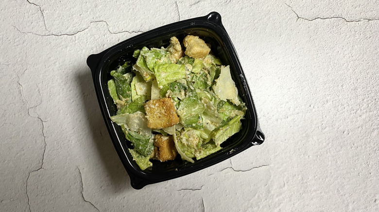 Red Robin's Everything Caesar Salad in a small takeout container