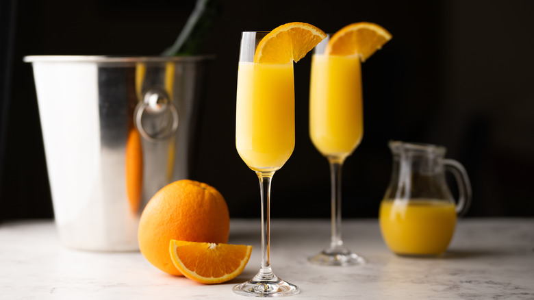 Mimosa cocktails with fresh orange slices