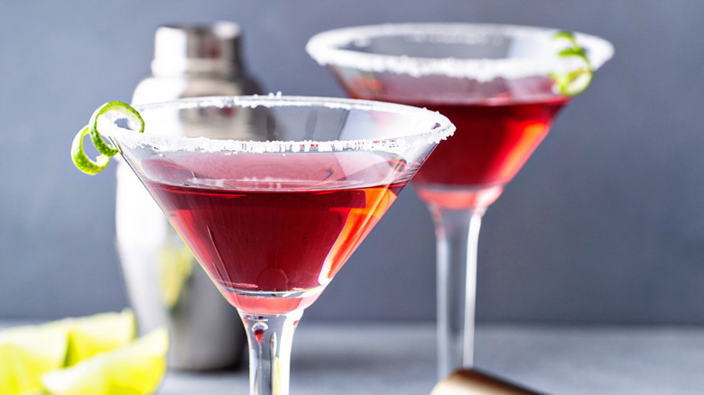 Cosmopolitan martinis with a sugar rim and lime twist