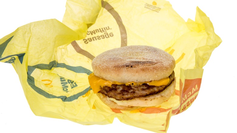 an unwrapped Sausage McMuffin with eggs