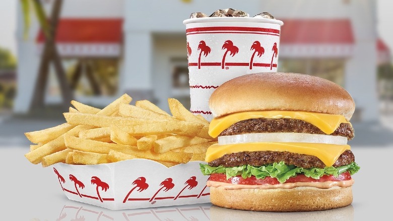 An In-N-Out burger with fries and a drink