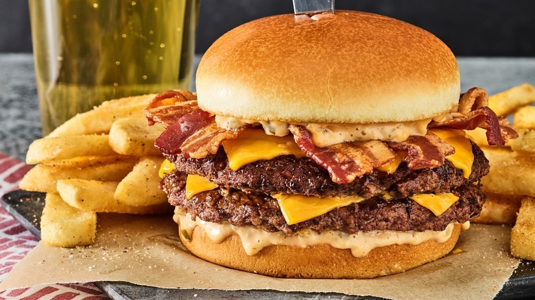A Red Robin bacon cheeseburger with fries