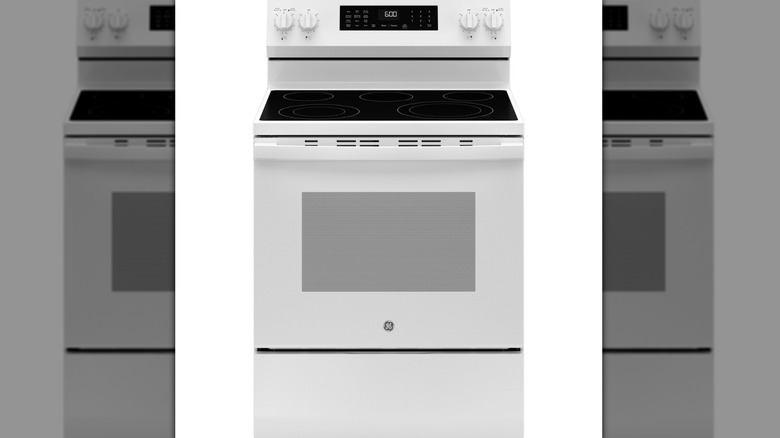 A white gas range with a convection cooktop