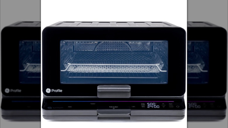 A compact air fry oven with a glass door that gives you an overview of the tray inside