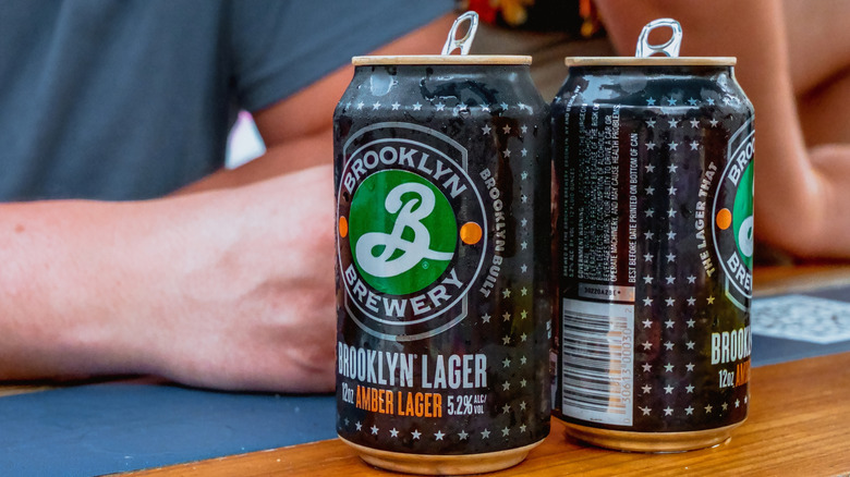 Opened cans of Brooklyn Amber Lager