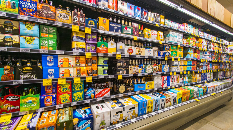 Coolers full of beer on display in store