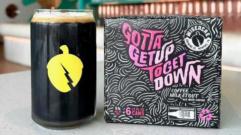 A glass and 6-pack of Wiseacre Gotta Get Up To Get Down Coffee Milk Stout