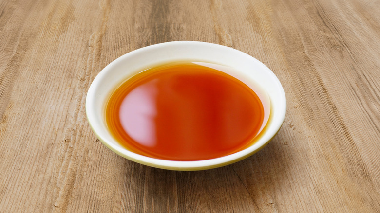 white dish with fish sauce