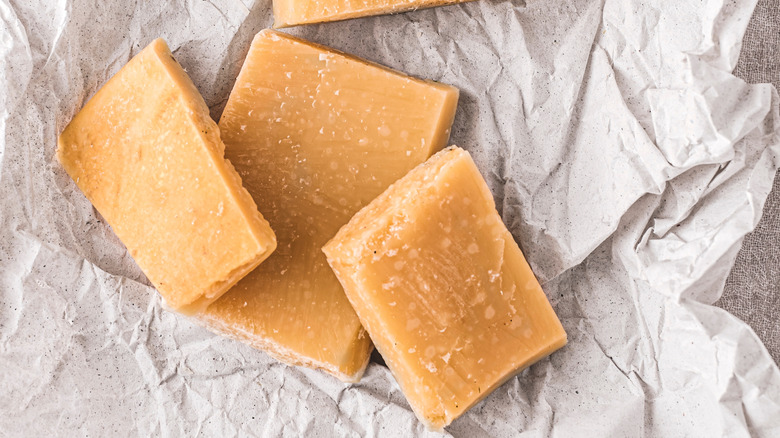 Parmesan rinds on parchment paper