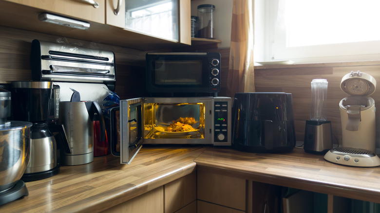 Cluttered kitchen appliances on a countertop