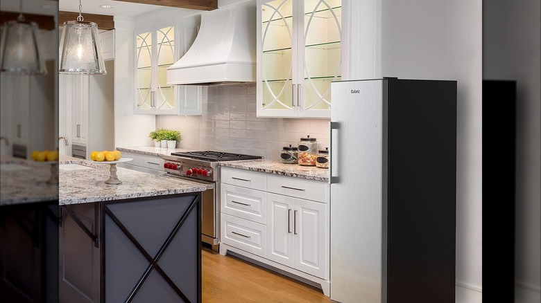 The Galanz upright refrigerator and freezer situated in a kitchen