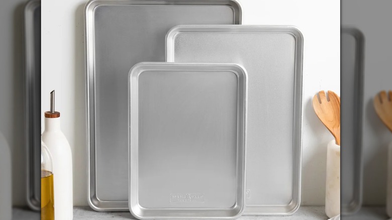Stet of baking trays displayed on kitchen counter
