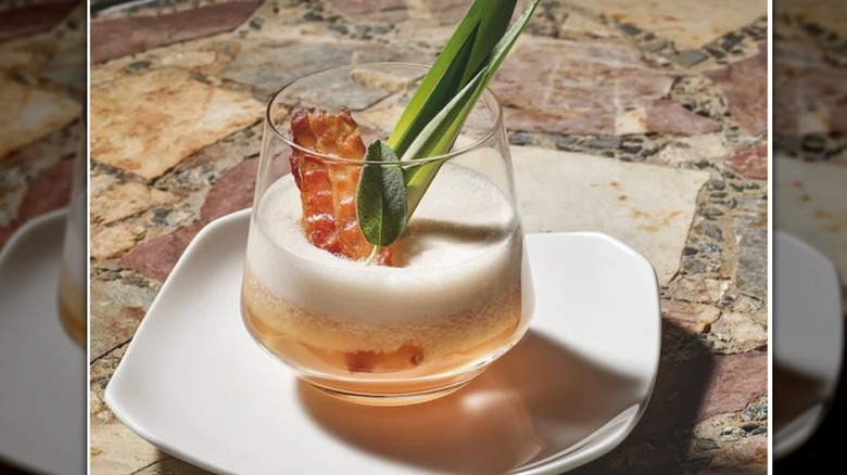 Zweisel Whisky glass with bacon and celery in it