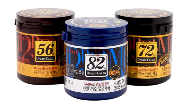 Three canisters of Lotte Dream Cacao chocolate