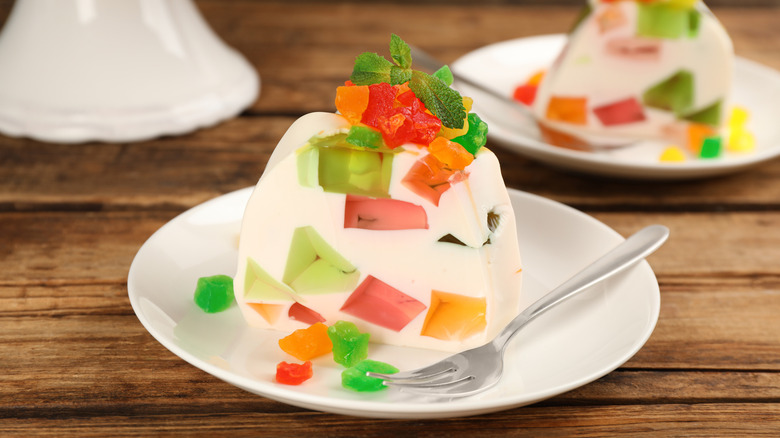 A slice of mosaic gelatina on a plate with a fork