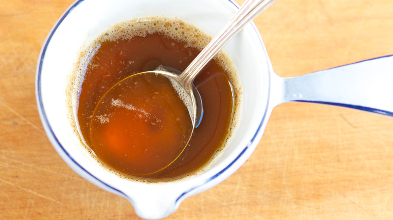 Browned butter in a cup