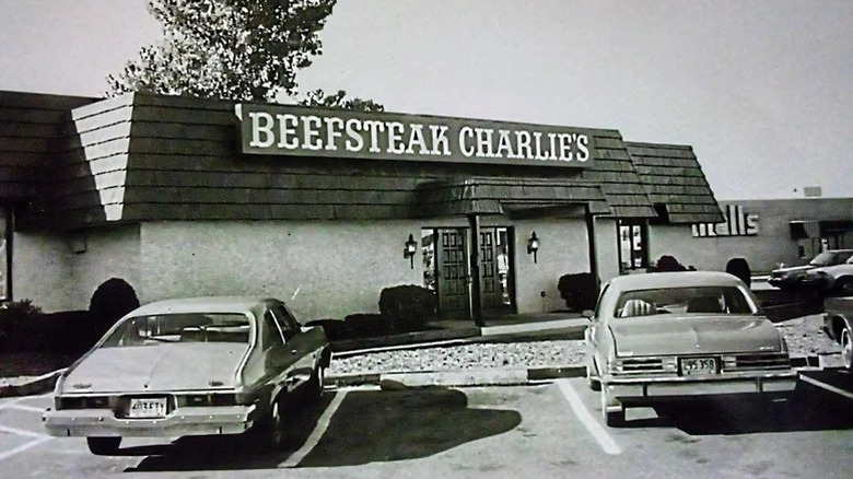 Exterior of Beefsteak Charlie's restaurant in black and white