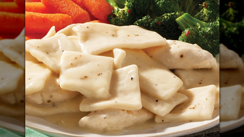 Chicken and dumplings with broccoli and carrots