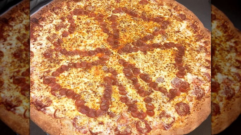 Giant pepperoni pizza with shamrock design