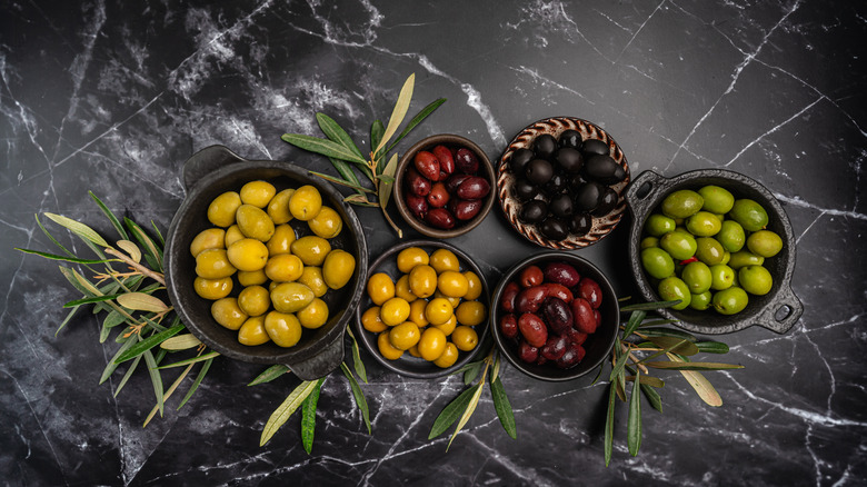 Bowls of multicolored olives