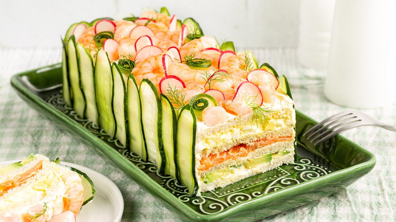 Frosted sandwich loaf decorated with vegetables