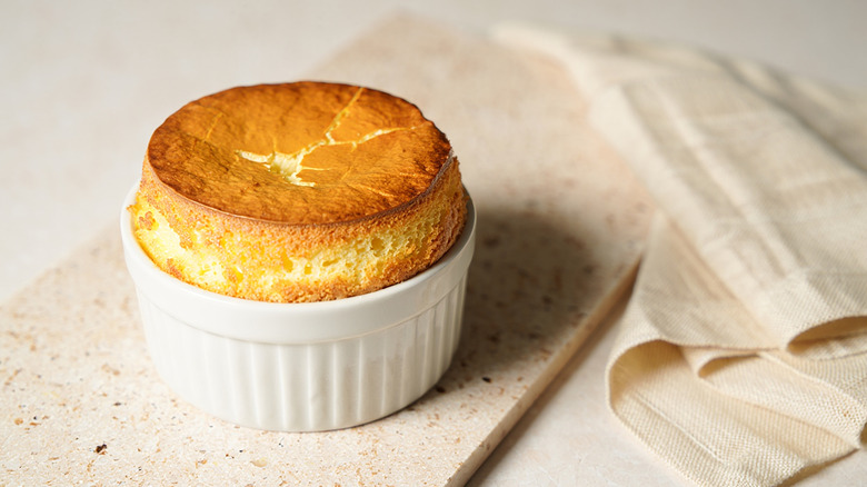 A cheese soufflé in a ramekin
