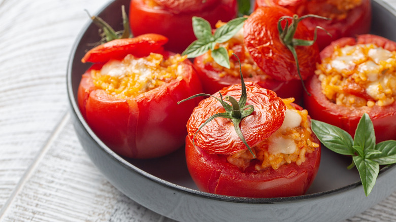 A plate of stuffed tomatoes