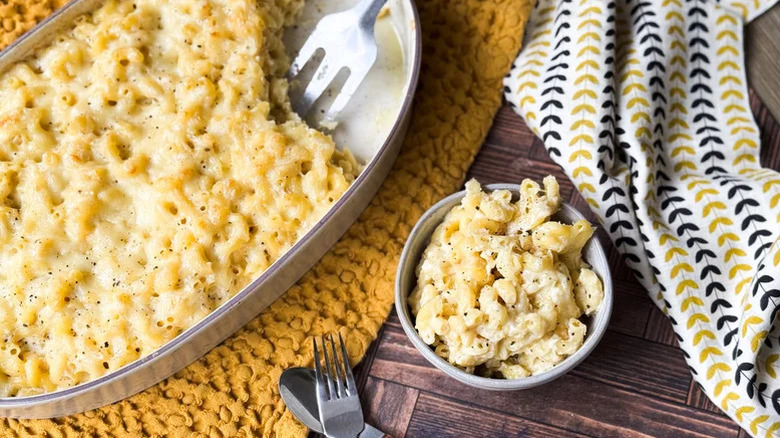 Casserole dish and small bowl of 3-Ingredient Baked Mac & Cheese