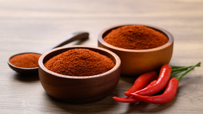 Bowls of cayenne pepper.