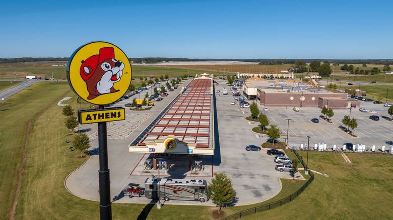 An aeriel view of a Bu-cees gas station with the cartoon beaver sign in the foreground