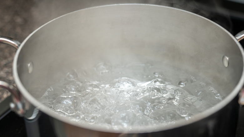 Boiling water in metal pot