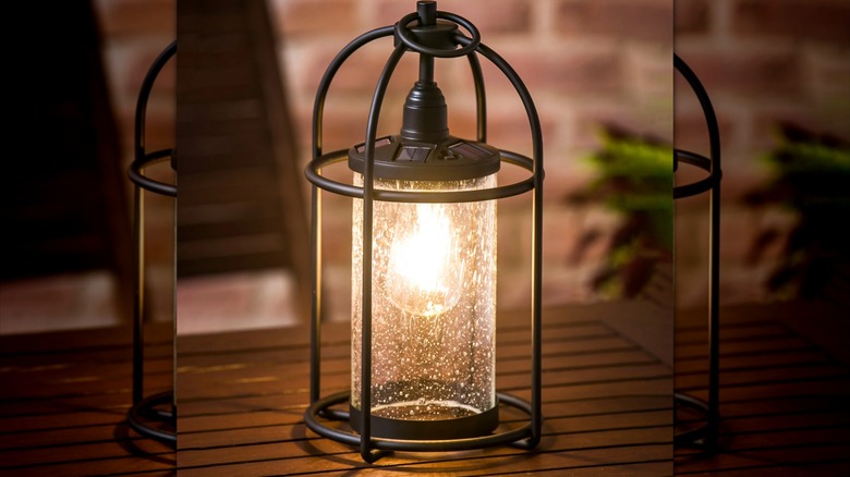 Edison-style lantern on wooden table