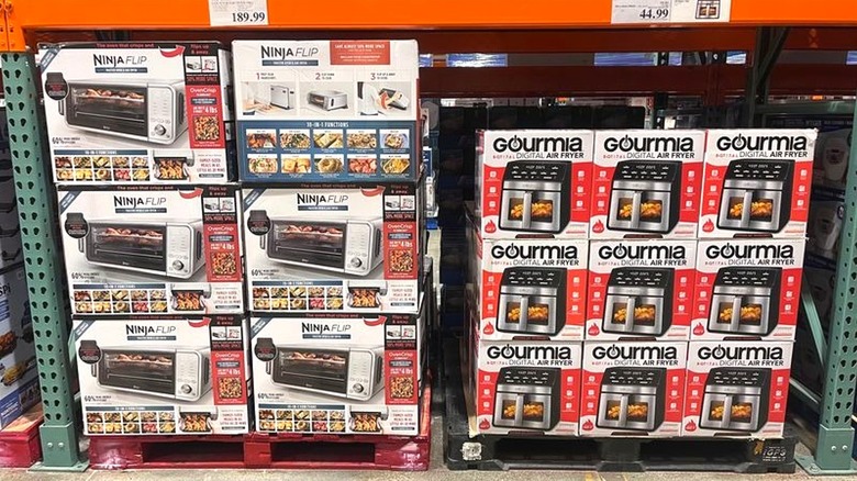 Small kitchen appliances on display inside Costco
