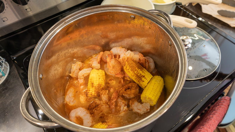 Seafood boil cooking on a pot