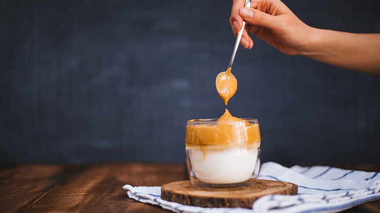 Creamy coffee in a cup