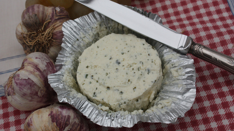 Disc of Boursin cheese in foil